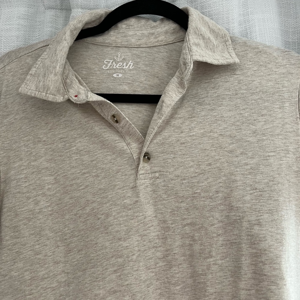 Casual, lightweight Polo. Size medium. Lightly used still in great condition.